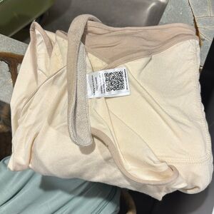 Taking Cara Babies B.E.S.T. Swaddle in Coconut Cream best swaddle